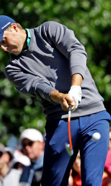 The Latest: Wind blasts Horschel's ball into water on 15